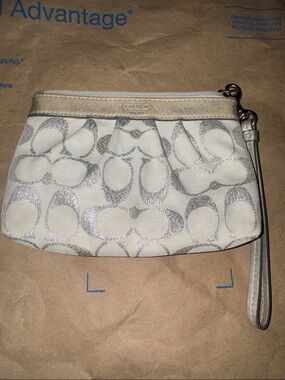 Coach Cream Canvas Wristlet with Silver Signature Print